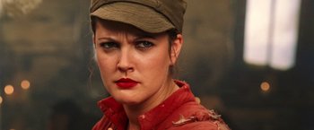 Movie still from “Charlie's Angels: Full Throttle” (2003), directed by McG – A person wearing a hat; Close Up shot, Over the shoulder angle