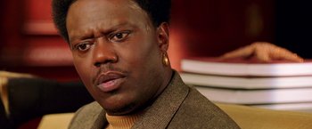 Movie still from “Charlie's Angels: Full Throttle” (2003), directed by McG – A person wearing a jacket; Close Up shot, Low angle