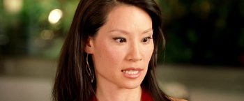 Movie still from “Charlie's Angels: Full Throttle” (2003), directed by McG – A person with long black hair; Close Up shot, High angle