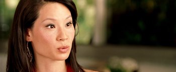Movie still from “Charlie's Angels: Full Throttle” (2003), directed by McG – A person with long hair; Close Up shot, High angle