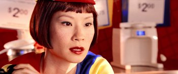 Movie still from “Charlie's Angels: Full Throttle” (2003), directed by McG – A person wearing a hat; Close Up shot, Over the shoulder angle