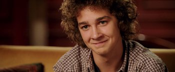 Movie still from “Charlie's Angels: Full Throttle” (2003), directed by McG – A person with curly brown hair; Close Up shot, High angle