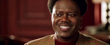 Movie still from “Charlie's Angels: Full Throttle” (2003), directed by McG – A person wearing a jacket; Close Up shot, Low angle