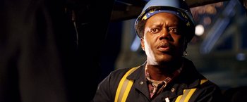 Movie still from “Charlie's Angels: Full Throttle” (2003), directed by McG – A person wearing a hat; Close Up shot, Low angle