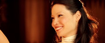 Movie still from “Charlie's Angels: Full Throttle” (2003), directed by McG – A woman smiling for the camera; Close Up shot, High angle