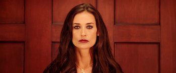 Movie still from “Charlie's Angels: Full Throttle” (2003), directed by McG – A person with long brown hair; Close Up shot, High angle