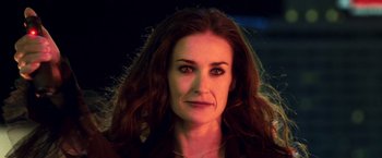 Movie still from “Charlie's Angels: Full Throttle” (2003), directed by McG – A person with long red hair; Close Up shot, Low angle