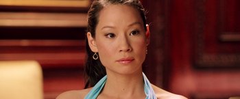 Movie still from “Charlie's Angels: Full Throttle” (2003), directed by McG – A person wearing a blue shirt; Close Up shot, High angle