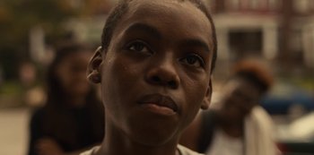 Movie still from “Charm City Kings” (2020), directed by Angel Manuel Soto – A person looking up at the sky; Close Up shot, Low angle