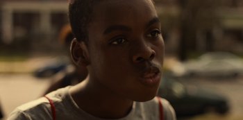 Movie still from “Charm City Kings” (2020), directed by Angel Manuel Soto – A young man's eyes and nose; Close Up shot, Low angle