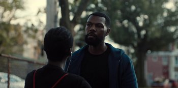 Movie still from “Charm City Kings” (2020), directed by Angel Manuel Soto – A man with a beard talking to another man; Close Up shot, Over the shoulder angle