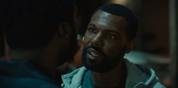 Movie still from “Charm City Kings” (2020), directed by Angel Manuel Soto – A person talking to another person; Close Up shot, Over the shoulder angle