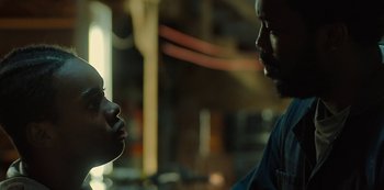 Movie still from “Charm City Kings” (2020), directed by Angel Manuel Soto – A man and a woman talking to each other; Close Up shot, Over the shoulder angle