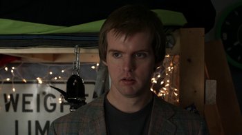 Movie still from “Cherry” (2010), directed by Jeffrey Fine – A person wearing a jacket; Close Up shot, Over the shoulder angle