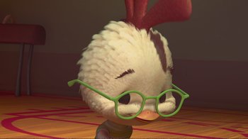 Movie still from “Chicken Little” (2005), directed by Mark Dindal – An animated chicken wearing a pair of green glasses; Close Up shot, High angle