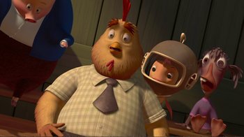 Movie still from “Chicken Little” (2005), directed by Mark Dindal – A man with a chicken head and a woman with a helmet; Medium shot, High angle