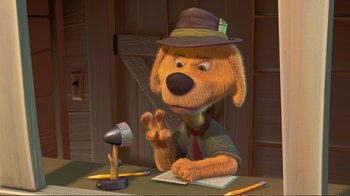 Movie still from “Chicken Little” (2005), directed by Mark Dindal – A cartoon dog wearing a hat sitting at a desk; Medium shot, High angle