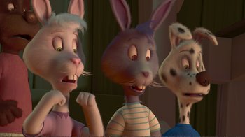Movie still from “Chicken Little” (2005), directed by Mark Dindal – A group of three cartoon characters standing next to each other; Close Up shot, High angle