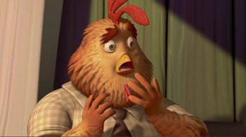 Movie still from “Chicken Little” (2005), directed by Mark Dindal – An image of a cartoon character that has a chicken head on his head; Close Up shot, High angle