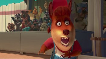 Movie still from “Chicken Little” (2005), directed by Mark Dindal – A dog with an open mouth standing in front of a group of people; Medium shot, High angle