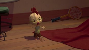 Movie still from “Chicken Little” (2005), directed by Mark Dindal – An animated chicken standing on the floor with his arms outstreched; Wide shot, High angle