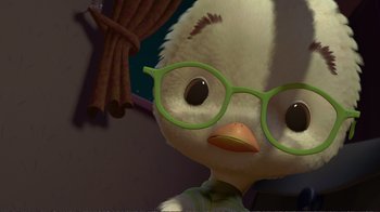 Movie still from “Chicken Little” (2005), directed by Mark Dindal – A stuffed animal wearing a pair of glasses; Close Up shot, High angle