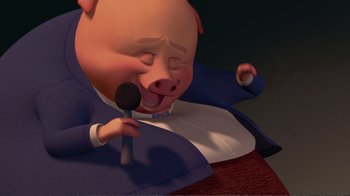Movie still from “Chicken Little” (2005), directed by Mark Dindal – A cartoon pig with a microphone in his mouth; Medium shot, High angle
