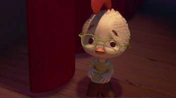 Movie still from “Chicken Little” (2005), directed by Mark Dindal – A chicken wearing a pair of green glasses; Medium shot, High angle