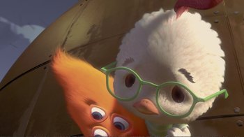 Movie still from “Chicken Little” (2005), directed by Mark Dindal – A couple of cartoon characters are sitting next to each other; Close Up shot, High angle