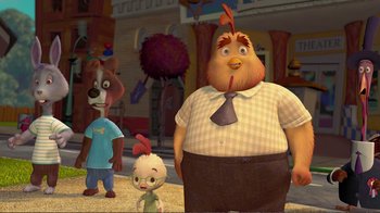 Movie still from “Chicken Little” (2005), directed by Mark Dindal – A group of people standing next to each other on a field; Medium shot, High angle