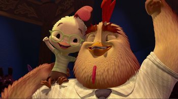 Movie still from “Chicken Little” (2005), directed by Mark Dindal – A couple of cartoon characters sitting next to each other on a bed; Medium shot, Low angle