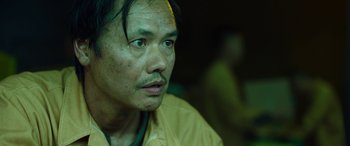 Movie still from “Child's Play” (2019), directed by Lars Klevberg – A person wearing a yellow shirt; Close Up shot, Low angle
