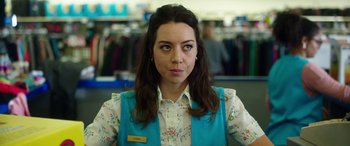 Movie still from “Child's Play” (2019), directed by Lars Klevberg – A woman in a blue vest and a floral shirt; Close Up shot, Over the shoulder angle