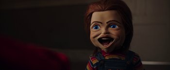Movie still from “Child's Play” (2019), directed by Lars Klevberg – A chucky doll's face; Close Up shot, Low angle