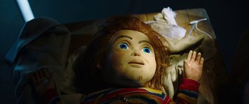 Movie still from “Child's Play” (2019), directed by Lars Klevberg – The head of a chucky doll; Close Up shot, Overhead angle