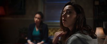 Movie still from “Child's Play” (2019), directed by Lars Klevberg – Two women sitting in front of each other in a room; Close Up shot, Over the shoulder angle