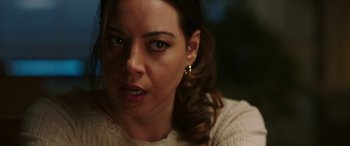 Movie still from “Child's Play” (2019), directed by Lars Klevberg – A person wearing a white sweater; Close Up shot, Over the shoulder angle