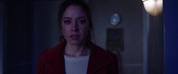 Movie still from “Child's Play” (2019), directed by Lars Klevberg – A person wearing a red jacket; Close Up shot, Over the shoulder angle