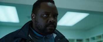 Movie still from “Child's Play” (2019), directed by Lars Klevberg – A person wearing a jacket; Close Up shot, Low angle