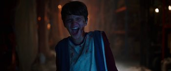 Movie still from “Child's Play” (2019), directed by Lars Klevberg – A young boy with blood all over his face; Close Up shot, Low angle
