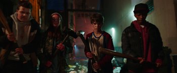 Movie still from “Child's Play” (2019), directed by Lars Klevberg – A group of people standing in a room; Medium shot, Low angle