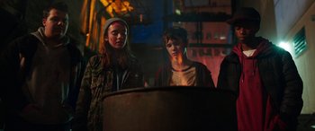 Movie still from “Child's Play” (2019), directed by Lars Klevberg – Two young people standing in front of a large pot; Medium shot, Low angle