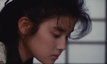 Movie still from “Chizuko's Younger Sister” (1991), directed by Nobuhiko Ôbayashi – A person's face; Close Up shot, High angle
