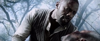 Movie still from “The Dark Tower” (2017), directed by Nikolaj Arcel – A person with a beard; Close Up shot, Low angle
