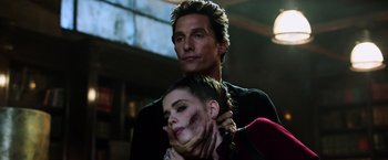 Movie still from “The Dark Tower” (2017), directed by Nikolaj Arcel – A man standing next to a woman in a dark room; Close Up shot, Low angle