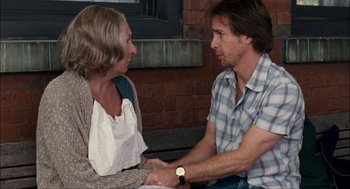 Movie still from “Choke” (2008), directed by Clark Gregg – A man and a woman sitting on a bench; Medium shot, Over the shoulder angle