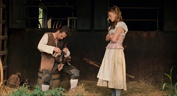 Movie still from “Choke” (2008), directed by Clark Gregg – A man and a woman dressed in medieval clothing; Medium shot, Over the shoulder angle