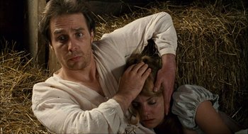 Movie still from “Choke” (2008), directed by Clark Gregg – A man and a woman laying on the ground; Close Up shot, High angle