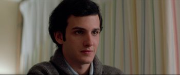 Movie still from “Christine” (1983), directed by John Carpenter – A person wearing a jacket; Close Up shot, Over the shoulder angle