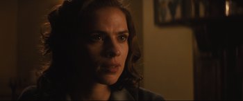 Movie still from “Christopher Robin” (2018), directed by Marc Forster – A person looking at the camera; Close Up shot, Over the shoulder angle